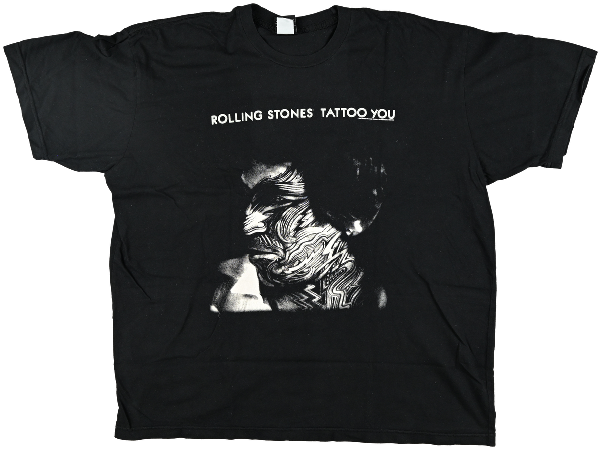"Tattoo You" - NORTH AMERICA & ETC - The Rolling Stones tattooed face in front